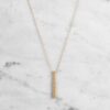 BusterPunch_Necklace_Vertical_Brass_1-scaled