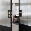 BP_Lifestyle_Crop_Door_Hardware_Linear_Brass_Web_Square-scaled