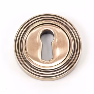 Polished Bronze Round Escutcheon (Beehive)