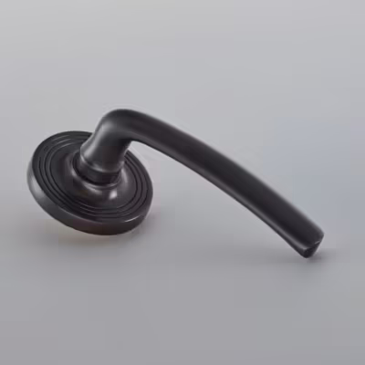 Floe Door Handle on 65mm Reeded Covered Rose