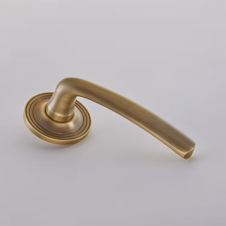 Floe Door Handle on Reeded Edge Covered Rose
